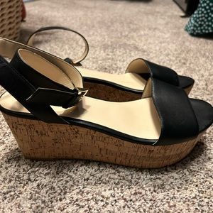 Excellent almost new condition Nine West “Farlin” wedge sandal, black, size 9M